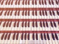 Close up view of a church pipe organ with four keyboards Royalty Free Stock Photo