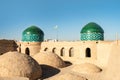 Close-up view city wall of Itchan Kala ancient town at dawn, oriental architecture, wildlife, Khiva, Uzbekistan. Top Royalty Free Stock Photo