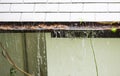 Close up view on clogged Rain Gutter in the rain. Home Guttering, Gutters Royalty Free Stock Photo