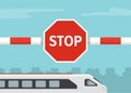 Close-up view of closed barrier and red stop sign. Express passenger train is approaching. Royalty Free Stock Photo