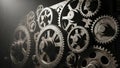 A close-up view of a cluster of interlocking metallic gears and cogwheels Royalty Free Stock Photo