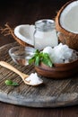 Close up view of coconut oil with MTC oil or medium chain triglycerides and coconut water. Healthy fat concept.