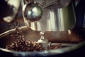 Close up view of coffee beans roasting in machine Royalty Free Stock Photo