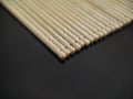 Wooden toothpicks on black background