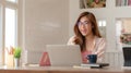 Close up view of college girl feeling happy when her assignment finished Royalty Free Stock Photo