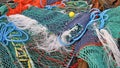 Close up view of colored ropes and nylon nets used to fish Royalty Free Stock Photo