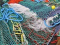 Close up view of colored ropes and nylon nets used to fish Royalty Free Stock Photo