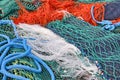 Close up view of colored ropes and nylon nets used to fish Royalty Free Stock Photo