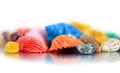 Close up view of Colored seas shells on white background