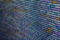 Close-up view of colorful computer code on screen, showing if statements and while loops in a dark background with Royalty Free Stock Photo