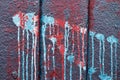 Close up view on colorful paint peeling off concrete walls found at a lost place in Kiel Germany Royalty Free Stock Photo