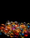 Close-up view of colorful soap bubbles on black background Royalty Free Stock Photo