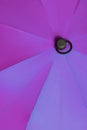 Close up view at the colorful surfaces of a rainproof umbrella