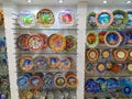 Close-up view of colorful Turkish plates displayed at an outdoor souvenir stand in Istanbul, Turkey