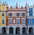 Close up view of colourful renaissance buildings in the historic Great Market Square in Zamosc in southeast Poland.