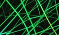 close-up view complex network intersecting green and black lines, creating visually striking abstract pattern. Royalty Free Stock Photo