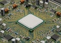 A close-up view of a computer circuit board with a central processor Royalty Free Stock Photo
