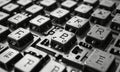 close-up view computer keyboard, focusing on the central keys with the letters \