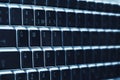 Close up view of a computer keyboard keys in blue tones Royalty Free Stock Photo