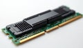 Close-up view of a computer RAM module with a heatsink. Green circuit board with gold connectors and black integrated chips. This Royalty Free Stock Photo