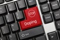 Conceptual keyboard - Doping red key with STOP sign Royalty Free Stock Photo