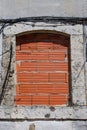 Close up view of concrete window covered with brick wall Royalty Free Stock Photo