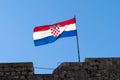 Close up view of the Croatian flag in a strong wind under a blue sky Royalty Free Stock Photo