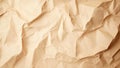 A close-up view of crumpled beige paper, showcasing unique textures and folds for creative backgrounds or design projects