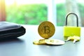 Cryptocurrency Bitcoin Isolated on Table with Padlock and Wallet