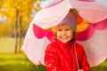 Close up view of cute small girl holding umbrella Royalty Free Stock Photo