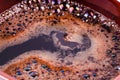 Close-up view of a dark aromatic coffee with foam on the top Royalty Free Stock Photo