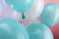 Close up view of decorative festive balloons on pink background. Royalty Free Stock Photo