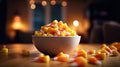 Close-up view of delicious candy corn bowl. Halloween treats. Royalty Free Stock Photo