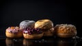 Close-up view of delicious stack of chocolate glazed donuts with various toppings.