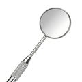 A close-up view of a dental examination mirror with a reflective surface and textured handle Royalty Free Stock Photo