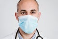 Close up view of doctor man wearing protective mask, gloves and stethoscope. Corona virus Covid-19 concept Royalty Free Stock Photo