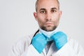 Close up view of doctor man wearing protective mask, gloves and stethoscope. Corona virus Covid-19 concept Royalty Free Stock Photo