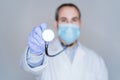 close up view of doctor man wearing protective mask, gloves and stethoscope. Coronavirus Covid-19 concept Royalty Free Stock Photo