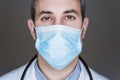 close up view of doctor man wearing protective mask and stethoscope. Coronavirus Covid-19 concept Royalty Free Stock Photo