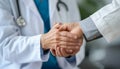 Close up view of doctor touching patient hand, showing empty and kindness