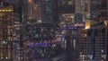Close up view of Dubai Marina showing canal surrounded by skyscrapers along shoreline night timelapse. DUBAI, UAE Royalty Free Stock Photo