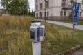 Close up view of electric charging station on public car parking. Uppsala, Sweden.