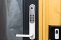 Close up view of an electric combination lock on a black door. Interior design. Royalty Free Stock Photo