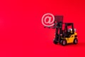 Close-up view of electric forklift carrying lifting up mail factory production searching partnership supply manager