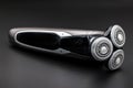 Electric rotary shaver with three-blade head Royalty Free Stock Photo