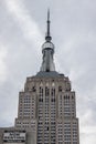 Close-up view of the Empire state building on a cloudy sky background Royalty Free Stock Photo