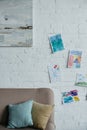 close up view of empty childish room with sofa and colorful drawings