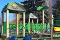 Close up view of empty old wooden playground in spring sunny day. Closed children`s playground during isolation period in Kyiv