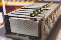 Close-up view of equipment for bitcoin cryptocurrency mining farm, electronic devices with fans, concept of mining technology Royalty Free Stock Photo