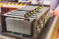 Close-up view of equipment for bitcoin cryptocurrency mining farm, electronic devices with fans, concept of mining technology Royalty Free Stock Photo